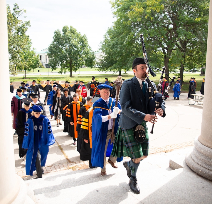 Academic convocation procession on the steps of Rockwell