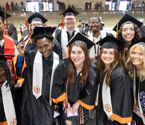 Graduates at commencement 