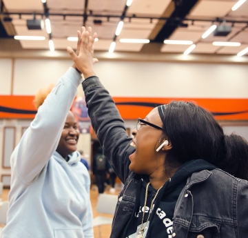 Students high-fiving